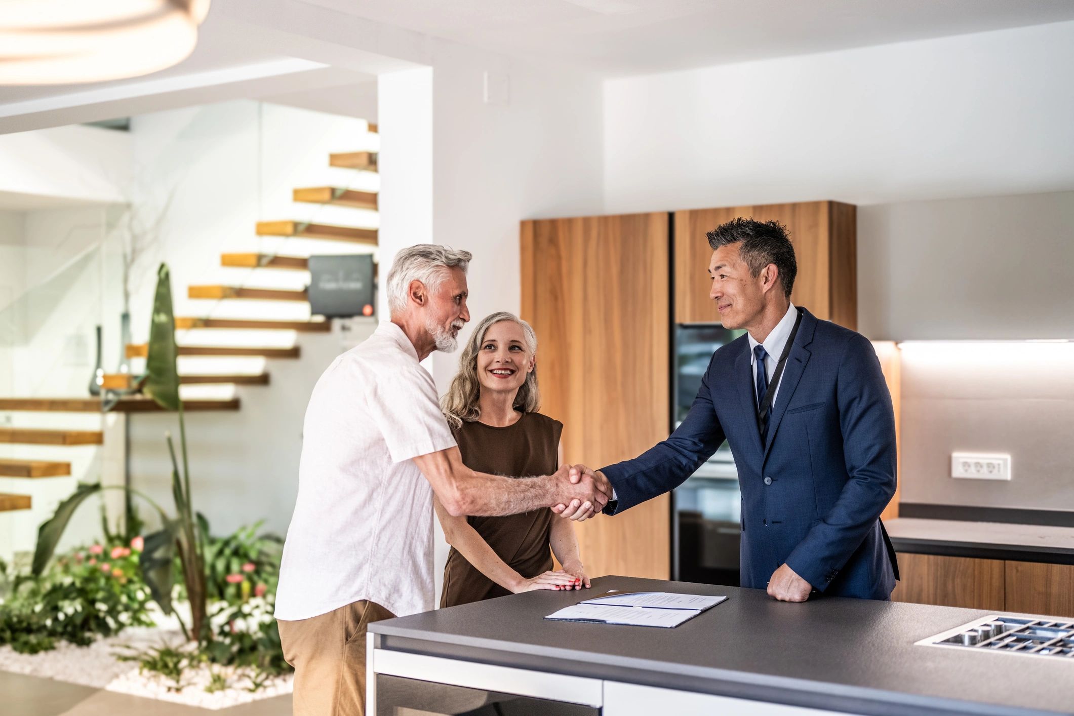 Real estate agent meeting with clients